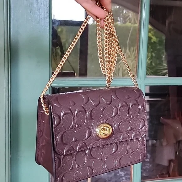 Coach Embossed Brown Crossbody Bag with Gold Chain